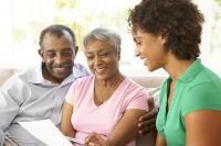 Care manager helping couple with their medical care.