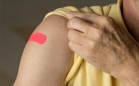 Vaccine bandaid on arm