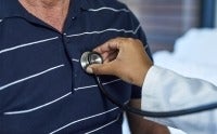 Doctor performing a heart check