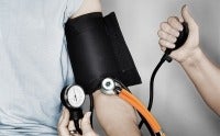 Blood pressure cuff in use