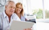 Couple researching Medicare options