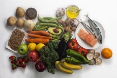 table laden with fruits, vegetables, grains and lean meats