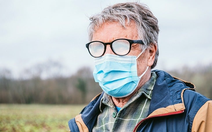 Man with foggy glasses