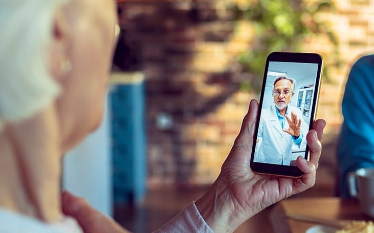  Woman on a video chat with her doctor