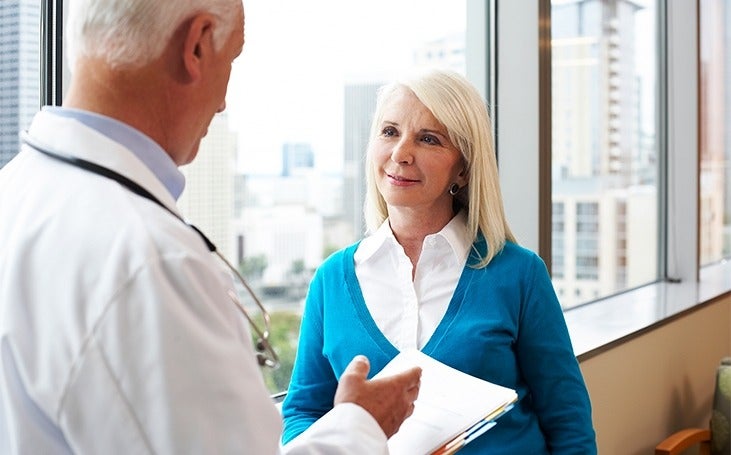 Woman with doctor