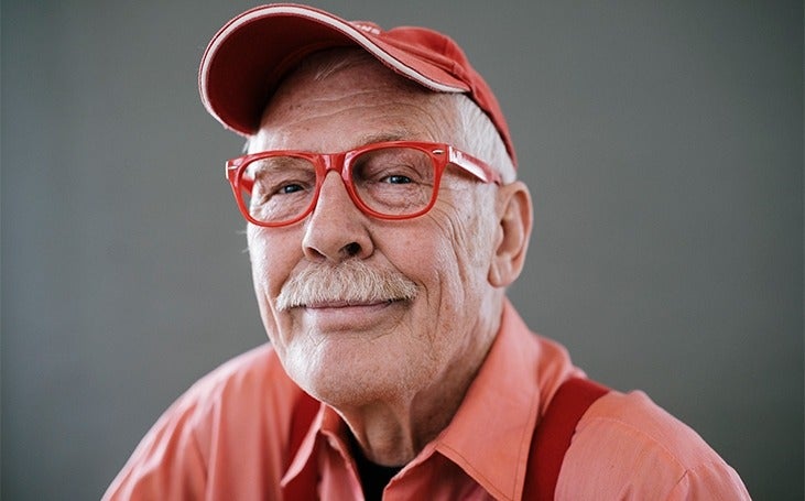Man with glasses smiling